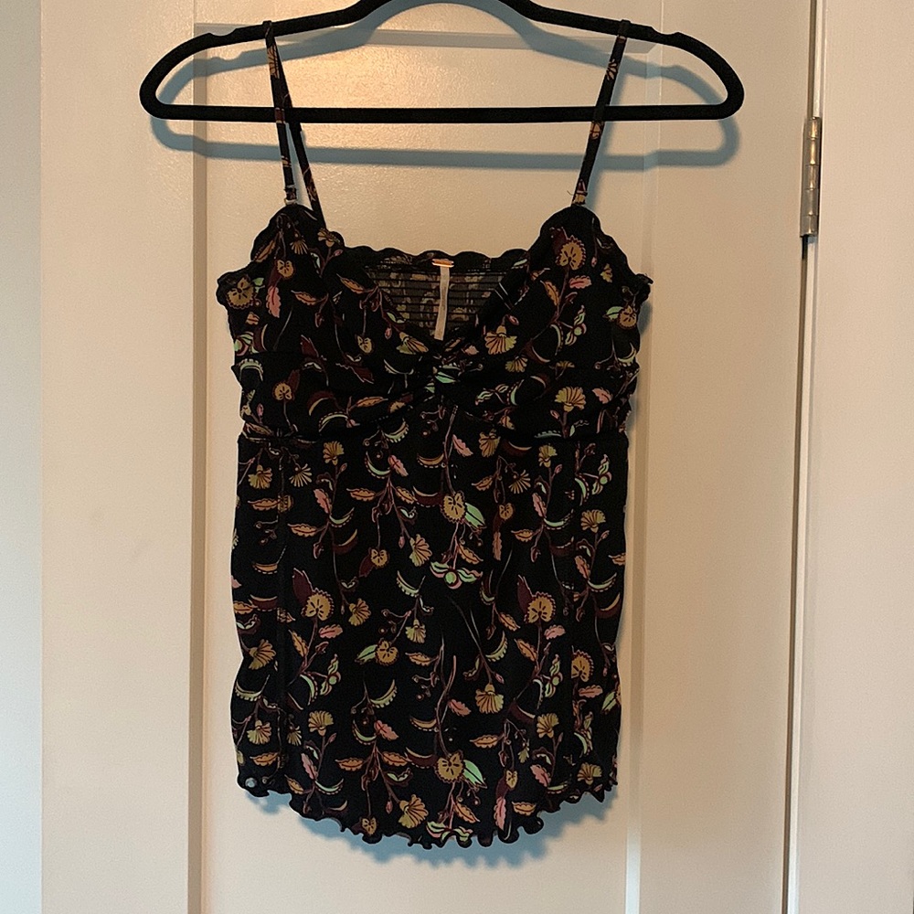 Free People L tank in great used condition.